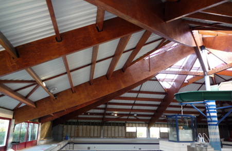 Réfection des charpentes, de l’étanchéité de la toiture et de la structure bois lamellé-collé.